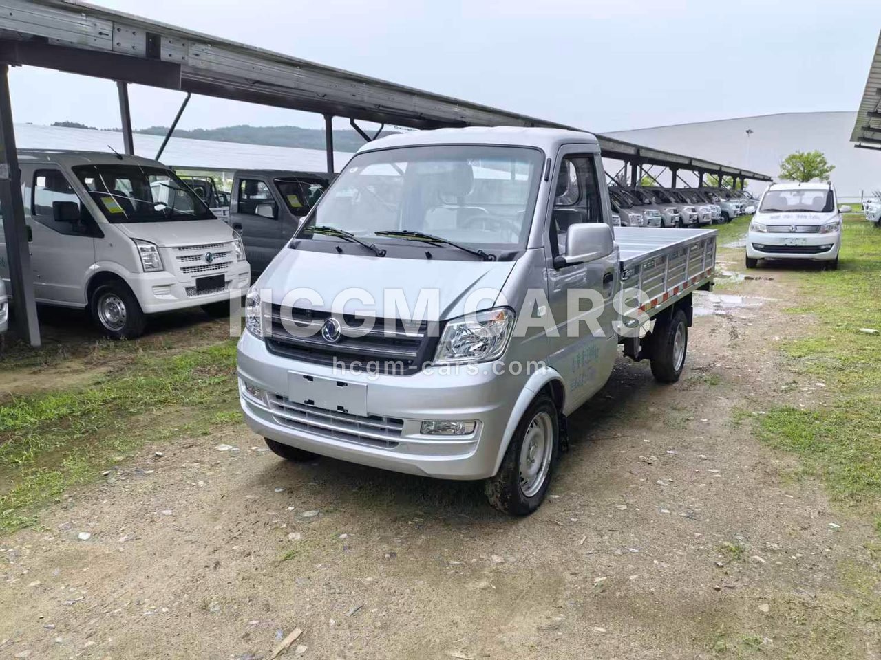 Silver DFSK K01L 1.3L petrol mini truck, front three-quarter view