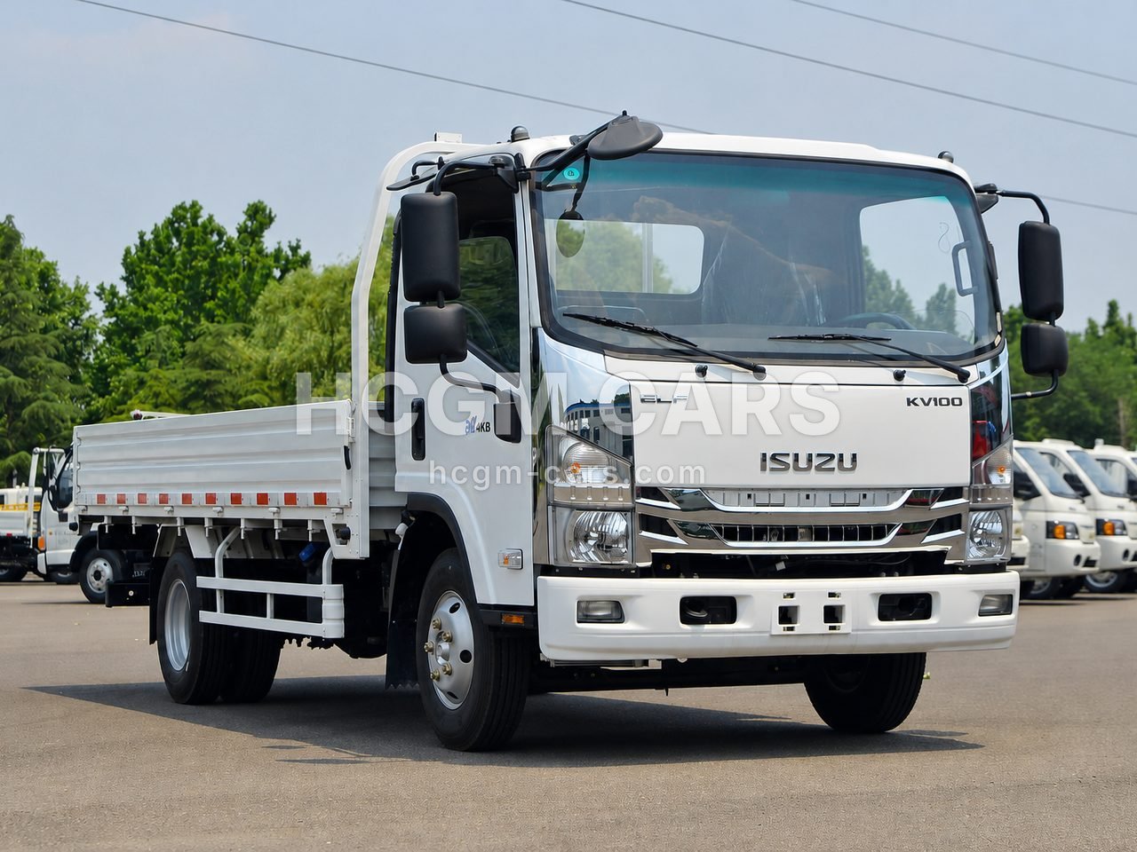 Isuzu KV100 131 hp cargo truck in white, front three-quarter view